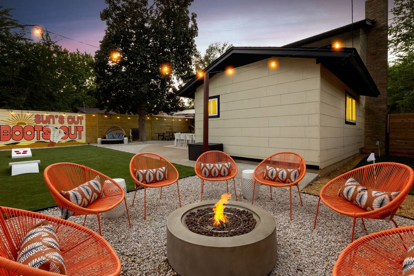cozy fire pit under string lights