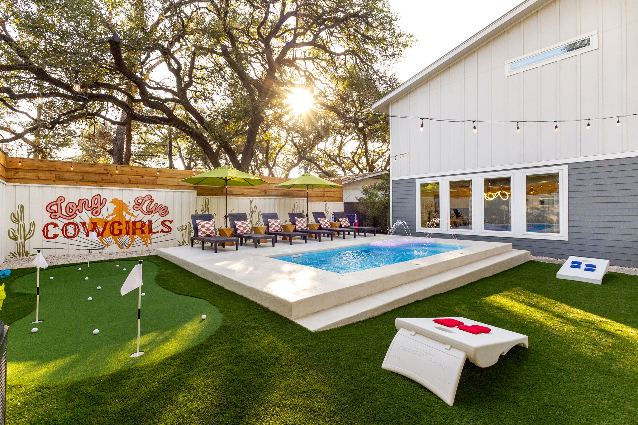 Resort backyard with pool at an Austin Good Stays Only home